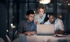 image of people working late